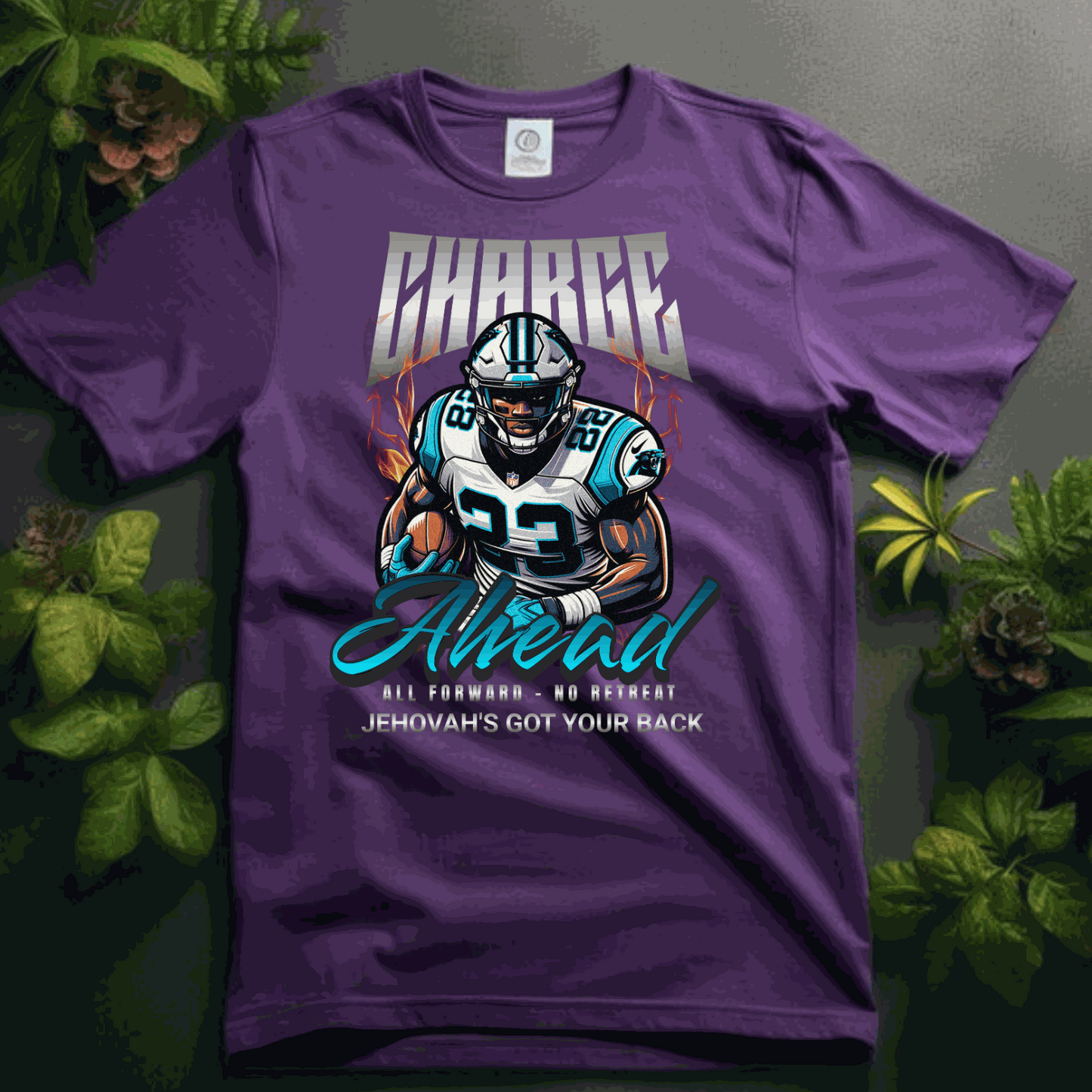 Purple unisex softstyle T-shirt featuring a football player graphic with "Charge Ahead" text and motivational phrases.